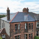 grey slate roof in glasgow with red ridges
